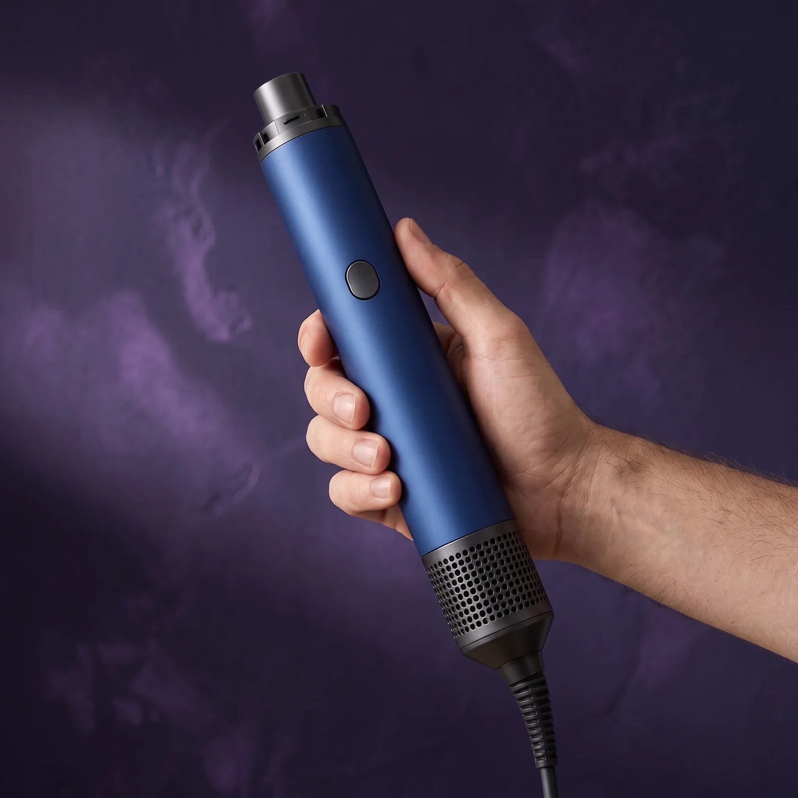 Close-up of the Zelivane styling handle held in one hand